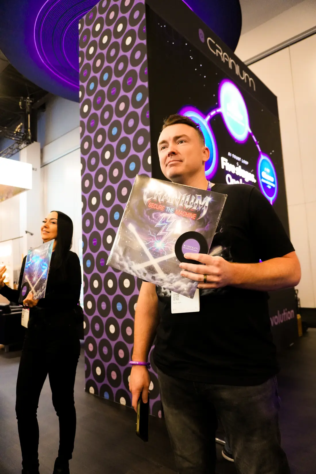 A visitor carrying his record back onto the floor