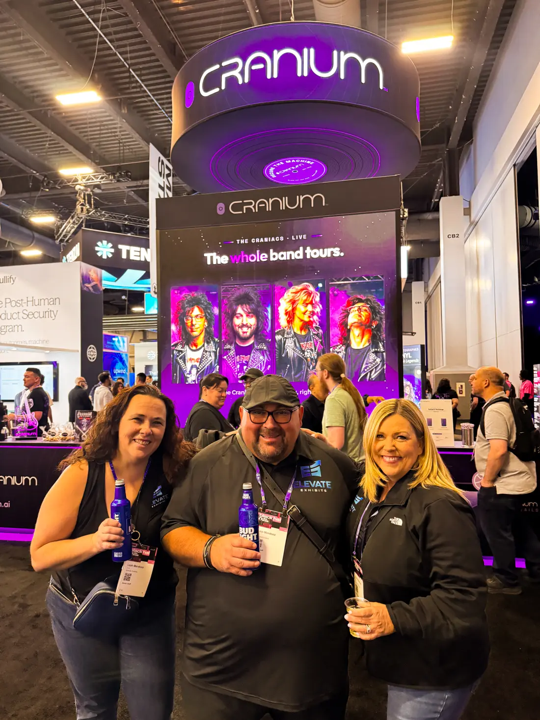 Attendees at the Cranium bar in front of the &ldquo;whole band tours&rdquo; wall
