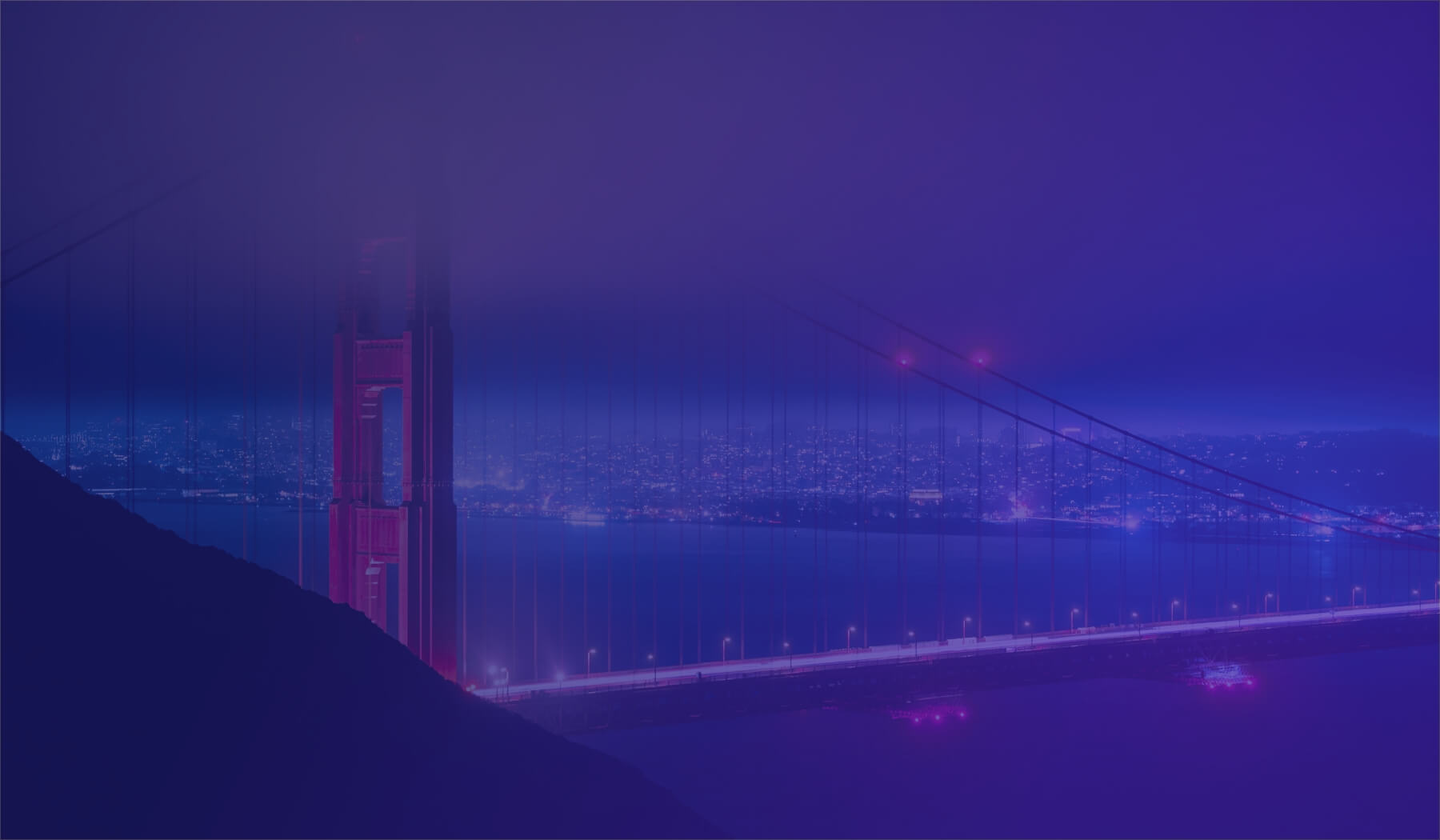 bridge overlooking city skyline with purple filter